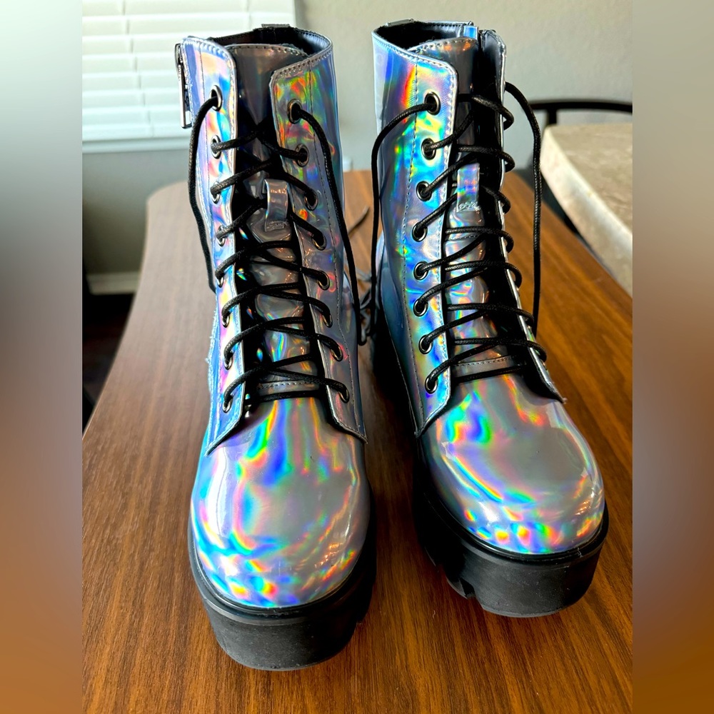 Current Mood holographic combat boots. I wear size 6.5 and they’re pretty small